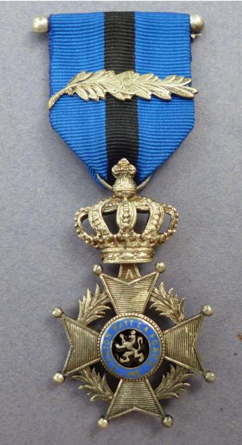 Belgium : Order of Leopold II 5th Class Knight's Badge with silver 'L' palm.