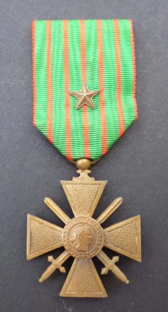 France : 1914-18 Croix de Guerre with bronze star on ribbon.
