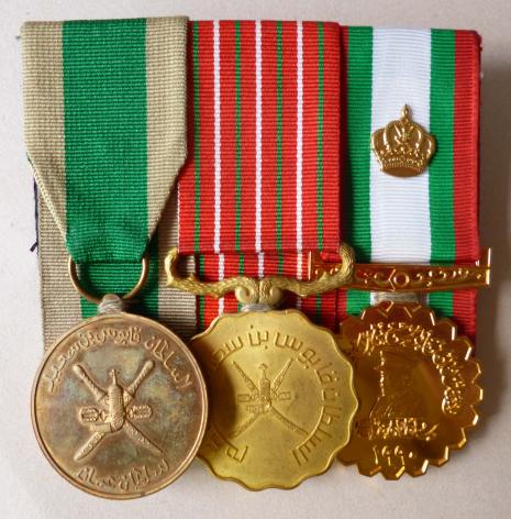 Oman : Group of three medals court-mounted as worn.