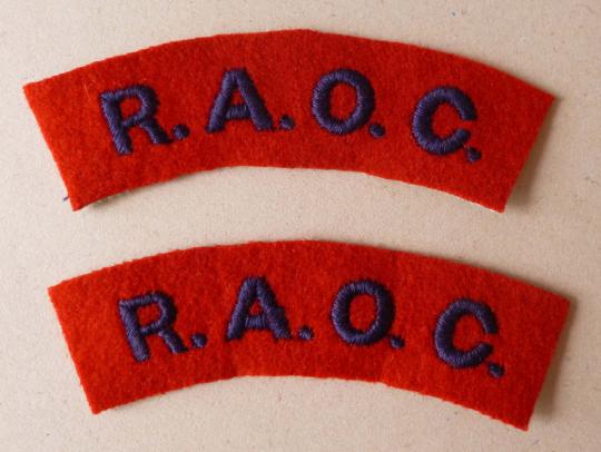 Pair of Royal Army Ordnance Corps 'R.A.O.C.' machine-embroidered cloth shoulder titles.
