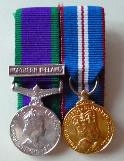 Court-mounted pair of miniature medals.