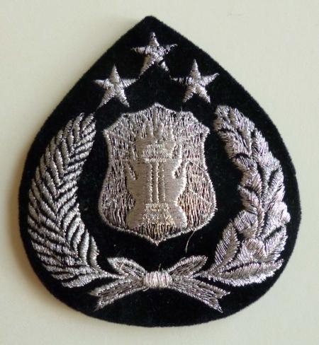 Indonesia : Police Officers Cap Badge.