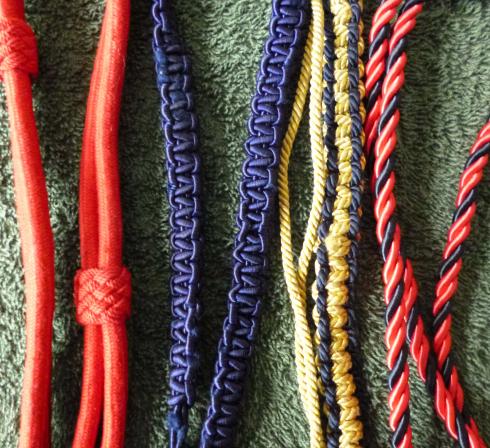 Four different British Army Regimental / Corps Lanyards.