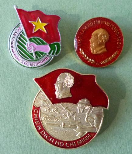 Vietnam : Three lightweight alloy North Vietnamese / Vietcong badges.