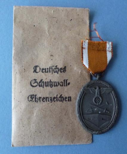 Third Reich : Westwall Medal (Deutsches Schutzwall-Ehrenzeichen) with original packet.