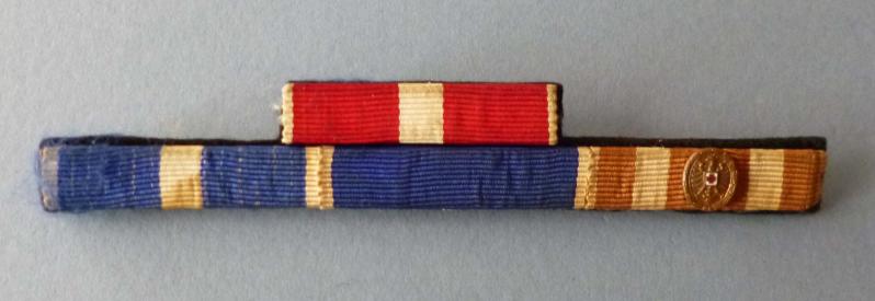 Austria : Post-war Four-medal Ribbon Bar with Miniature Red Cross Decoration.