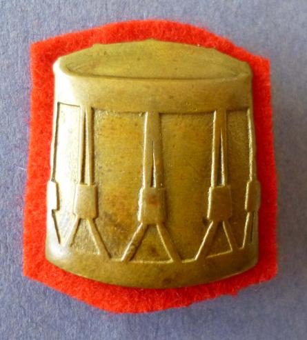 Army Qualified Drummers Gilding-metal Armbadge with Red Backing-cloth.