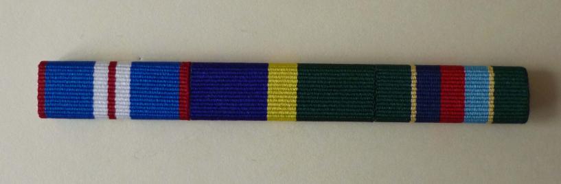 Medal-ribbon bar of three ribbons.