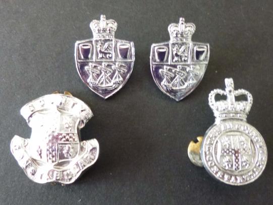 Police Collar badges - one Pair and two Odds.