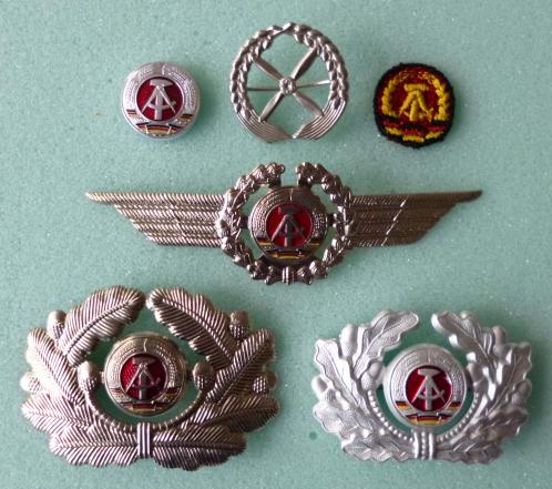 East Germany (DDR) : Group of Six East German Cap-badges.