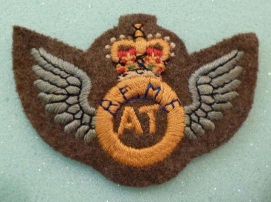 Royal Electrical & Mechanical Engineers (REME) Aircraft Technician's Queen's-crown Armbadge.