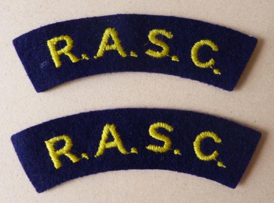 Pair of Royal Army Service Corps 'R.A.S.C.' Machine-embroidered Cloth Shoulder-titles.