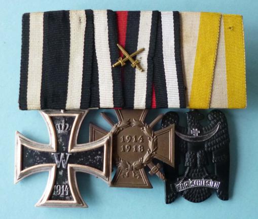 Imperial / Weimar :  German Mounted Group of Three Medals : 1914 Iron Cross 2nd Class / 1914-18 Cross of Honour with swords / Silesian Eagle 2nd Class.