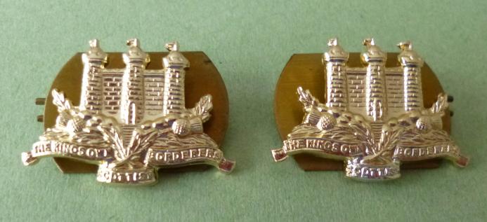 Pair of The King's Own Scottish Borderers Staybrite Collar-badges.