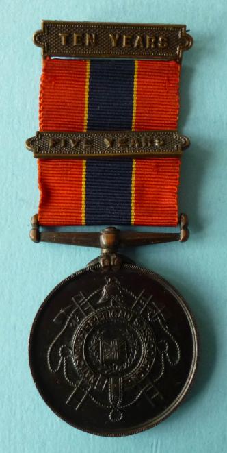 National Fire Brigades Association Long Service Bronze Medal for 10 Years Service together with a 5 Year Clasp.