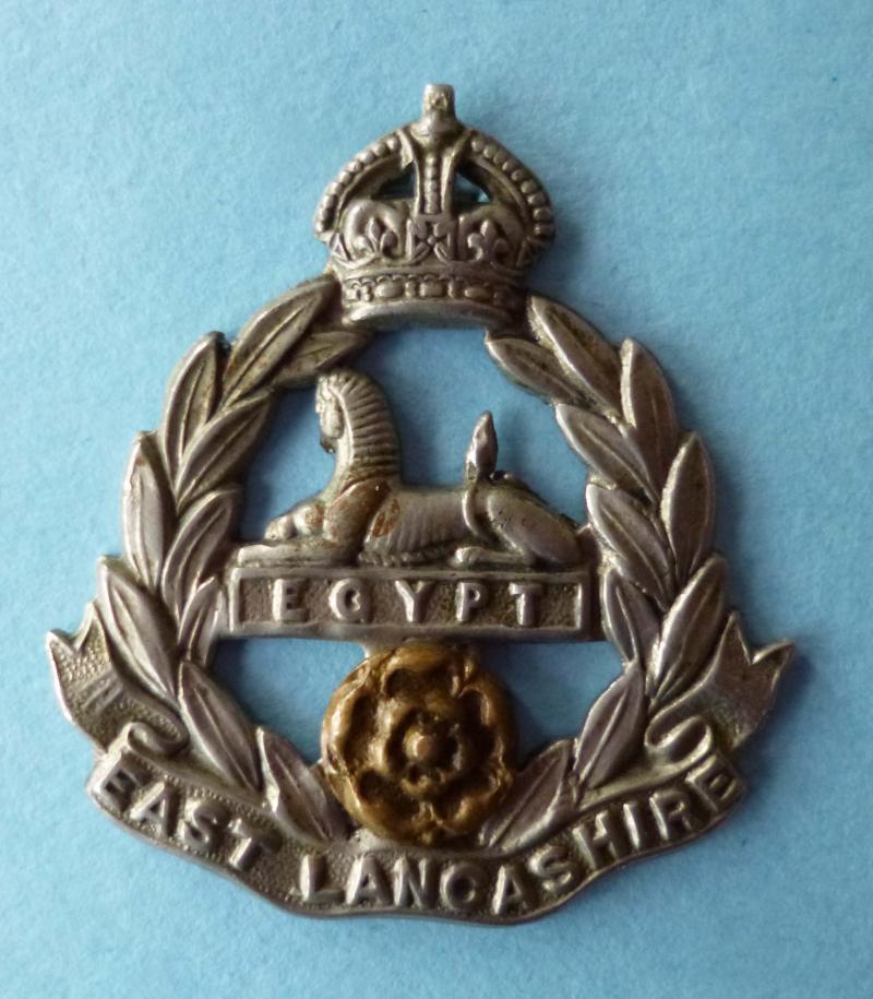 East Lancashire Regiment (King's crown) cap-badge.