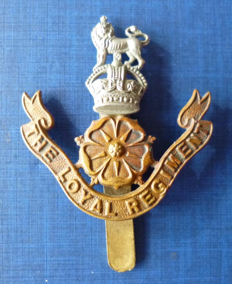 The Loyal Regiment King's crown Cap-badge.