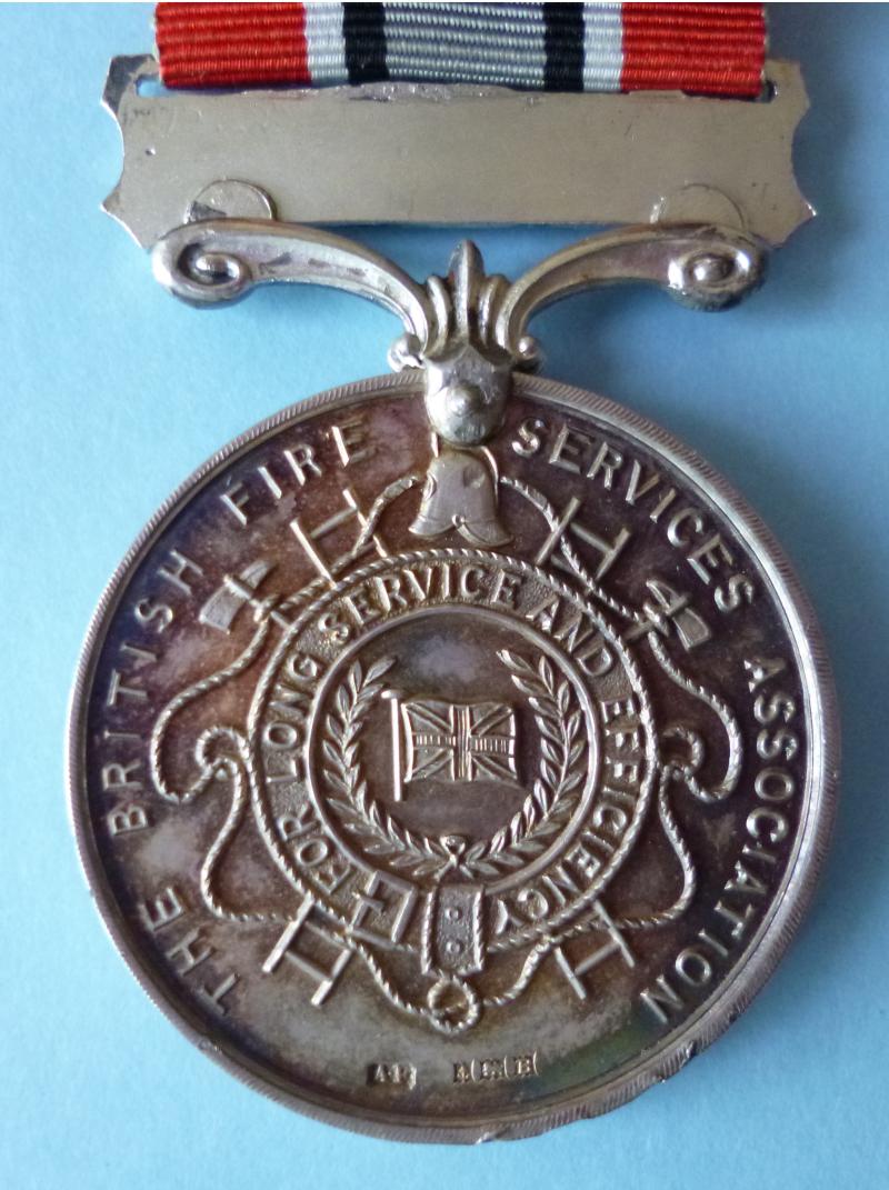 British Fire Services Association Medal in Silver named to J.H.Hull for Twenty Years Service.