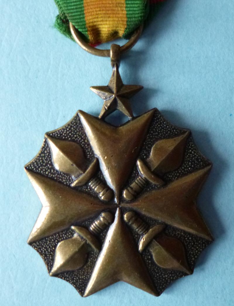 Zaire : Bronze (3rd Class) Medal of Civil Merit.