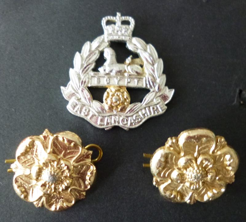 East Lancashire Regiment (Queen's crown) Staybrite Cap-badge plus Pair of Collar-badges.