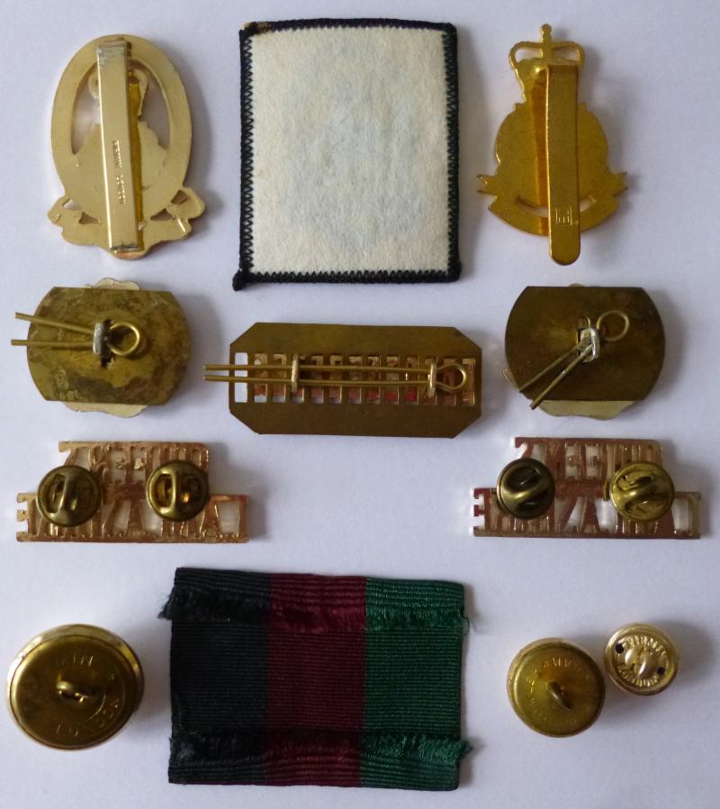 The Queen's Lancashire Regiment Grouping of Nine badges & Three Buttons.
