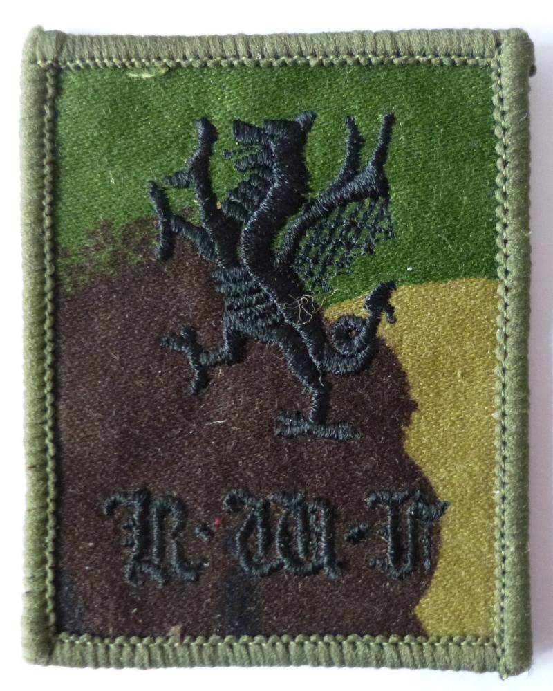 Royal Welch Fusiliers Grouping of Eleven Badges, One TRF & Three Buttons.